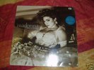 SIGNED (like a virgin LP -Madonna )