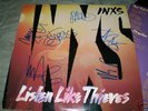 Signed  INXS Listen Like Thieves Album  , COA  RARE