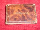 1960`S SMALL BROWN AUTOGRAPH BOOK WITH 20 PLUS AUTO`S