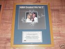 Framed signed album ABBA all band members COA