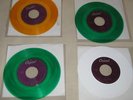 4 BEATLES SINGLES ON COLOURED VINYL US CAPITOL LABEL