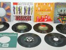 6 Beatles singles or 45 RPM records one EP. No Reserve
