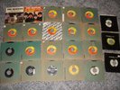 Collection of 24 Beatles 45's Tollie, Swan, Vee Jay & C