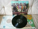 The Beatles Sgt. Pepper's Lonely Hearts Club Band Album 12