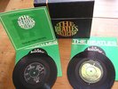 The Beatles Collection singles on 24 vinyl 45's