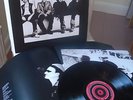 U2     Vinyl LP + Booklet     How To Dismantle An Atomic Bomb (2004)