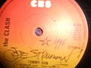 THE CLASH ( TOMMY GUN ) SIGNED BY JOE STRUMMER