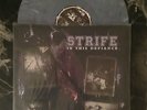 STRIFE in this defiance 12
