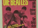 Die Beatles: Komm gib mir deine Hand/Sie liebt dich (Single Germany 1964)