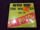Sex Pistols - 1977 SPOTS01 Never Mind the Bollocks - with sticker, poster, & 7