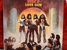KISS Love Gun vinyl LP with all inserts including Cardboard gun