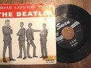 The Beatles 45 record She Loves You Swan S-4152