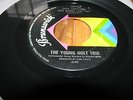 THE YOUNG HOLT TRIO-AIN'T THERE SOMETHING THAT MONEY CAN'T BUY/MELLOW-BRUNSWICK