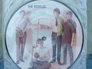 SEALED UNPLAYED THE BEATLES I FEEL FINE/SHE'S A WOMAN; VINYL PICTURE DISC 7