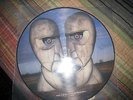 PINK FLOYD DIVISION BELL PICTURE DISC. NEW AND UNPLAYED. A MUST FOR FLOYD FANS.