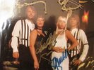 Japanese Dancing queen autographed single by Abba .