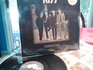 KISS Dressed to Kill with white circular hype sticker EMBOSSED cover...10