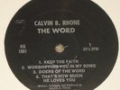 CALVIN B. RHONE 