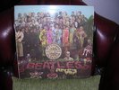 The Beatles vinyl album Sgt Pepper on Parlophone Mono PMC 7027 XEX 637-1/638-1