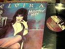 ELVIRA  HAUNTED HITS    MINT CONDITION/ POSTER