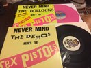 Sex Pistols NEVER MIND THE B*LLOCKS PINK VINYL LP & DEMO LP & Postcard & Badge.