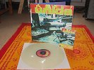 Kyuss: UNIDA - COPING WITH THE URBAN COYOTE. CLEAR vinyl. Plus Postcard