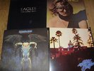 THE EAGLES JOE WALSH 4 VINYL LP ALBUMS ONE OF THESE NIGHTS HOTEL CALIFORNIA ETC