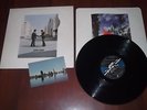 PINK FLOYD WISH YOU WERE HERE VINYL LP WITH POSTCARD AND PINCHED CORNERS.VG/EX.