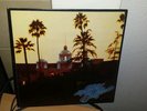 THE EAGLES HOTEL CALIFORNIA   1976 ASYLUM 7E-1084 STEREO Vinyl Record / Poster