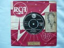 Elvis Presley record 'Wear my ring around your neck / Doncha' think it's time'