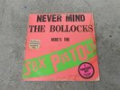 HERE'S THE SEX PISTOLS-NEVER MIND THE BOLLOCKS-LP-WL PROMO--SUBMISSION STICKER