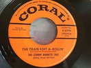 JOHNNY BURNETTE TRIO THE TRAIN KEPT A-ROLLIN'  M- CORAL ORIGINAL ROCKABILLY 45
