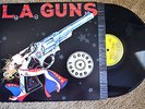 L.A. GUNS Cocked & Loaded w/ inner Heavy Metal RECORD LP VG++
