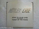 Mötley Crüe - Stick To Your Guns / Toast Of The Town (7