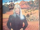 LARRY NORMAN - IN ANOTHER LAND - SIGNED BY LARRY NORMAN AND RANDY STONEHILL