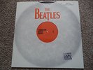 THE BEATLES TOMORROW NEVER KNOWS RED VINYL LP REISSUE  JOHN LENNON