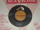 45RPM,  ELVIS PRESLEY.  I GOT A WOMAN  /  I'M COUNTING ON YOU.  VG+.