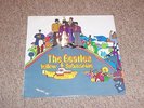 THE BEATLES , YELLOW SUBMARINE . LISTEN TO BOTH SIDES .