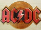AC/DC GUNS FOR HIRE SHAPED PIC DISC THE BACKGROUND IS DISCOLOURED BROWN AS ARE M