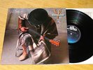 Stevie Ray Vaughan and Double Trouble. In Step. M-