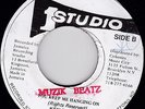KEN BOOTHE - YOU KEEP ME HANGING ON b/w Lloyd Charmers on  the STUDIO ONE  label