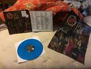 Slayer Reign in blood with poster on blue vinyl