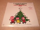 A Charlie Brown Christmas-Vince Guaraldi Trio LP. NEW F.Y.E. Red and Green Swirl