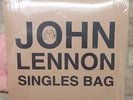 Beatles JOHN LENNON 2010 ' SINGLES BAG ' SET OF 3 SINGLES RECORD STORY DAY RSD