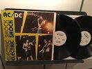 AC/DC ELECTRIC SHOCK 2LP RARE PLEASURE LOBE PL-09 NO TMOQ VG+ and UP LIVE 76-79