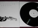 Slowhand 35th Anniversary import UK LP, Eric Clapton, was sealed opened to test