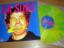 UK SUBS - NORMAL SERVICE RESUMED LP Green Splatter Vinyl with Poster