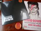 David Bowie Amsterdam single ltd orange vinyl sealed with 1 leaflet and a Badge