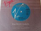 RENAUD - JONATHAN - 45T PRESSAGE CANADIEN - POCHETTE VIRGIN - 1988