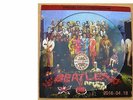 THE BEATLES . PICTURE DISC . SERGENT PEPPER'S LONELY HEARTS CLUB BAND  +  12